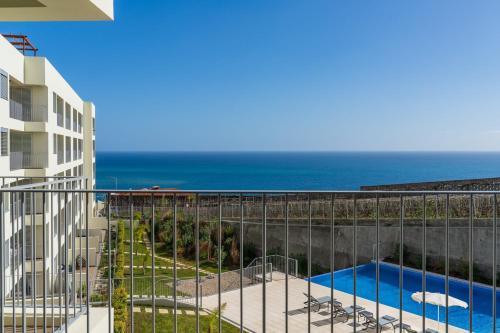 a balcony with a view of the ocean at BAsia Apartment by An Island Apart in Funchal