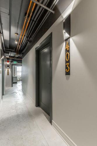 a hallway with a door in a building at Park Hotel Studio Suite 403 in Chattanooga