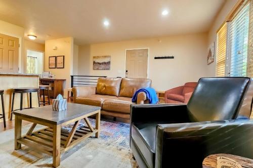 a living room with a couch and a table at Rustic Ridge MH304 Near Powder Mtn Hot Tub in Eden