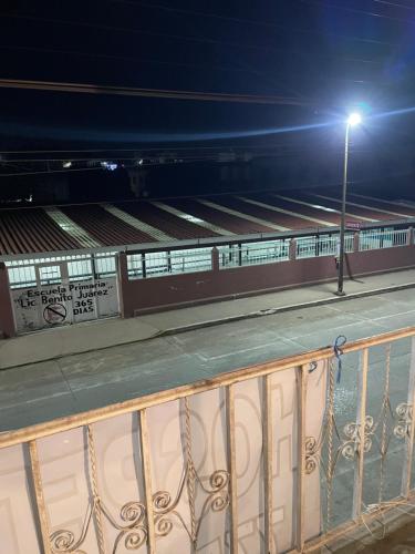 a train station at night with a street light at Casa Fuentes in Zacatlán