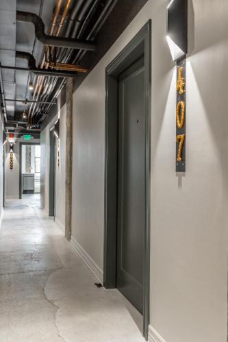 a door to a corridor in an office building at Park Hotel Studio Suite 407 in Chattanooga