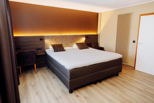 Katil atau katil-katil dalam bilik di Hotel Melba