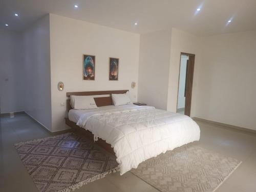 Tempat tidur dalam kamar di Villa dansou