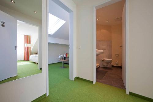 Ванна кімната в Hotel am Markt Garni - Aegidienberg