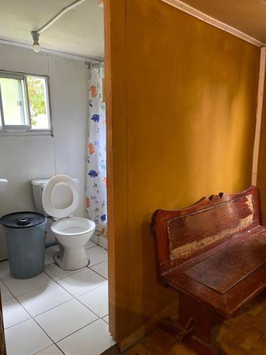 a bathroom with a toilet and a sink at Cabañas Donde Nancy in Hornillos
