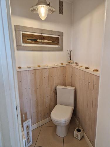 ARCACHON APPARTEMENT FACE PLAGE 5 pers Wi-Fi Parking Linge de maison gratuit 1chambre parentale 1cabine lits superposés 1 canapé lit