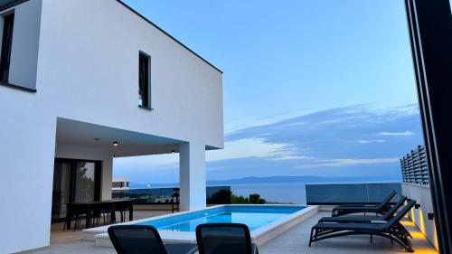 Modern Villa Ina with Heated Pool & Sea View in Makarska