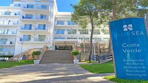 a sign in front of a building at BLUESEA Costa Verde in El Arenal