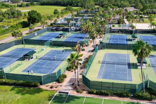 an overhead view of tennis courts at a resort at Golf Coast Bleu II - 3158 in Zephyrhills