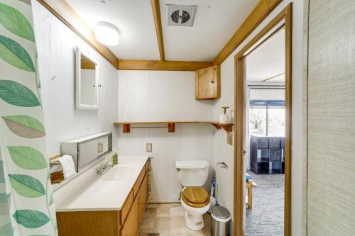 a bathroom with a toilet and a sink at Walk to Loop Trail! East Wenatchee Basecamp in East Wenatchee