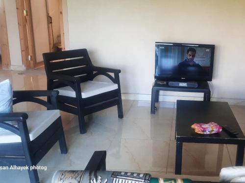 Televisor o centre d'entreteniment de استراحة الباشا albash farm stay