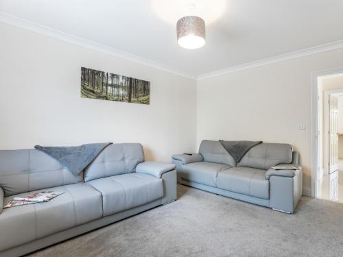 a living room with two couches and a couch at Dawson Park 10 - Uk12669 in Mablethorpe