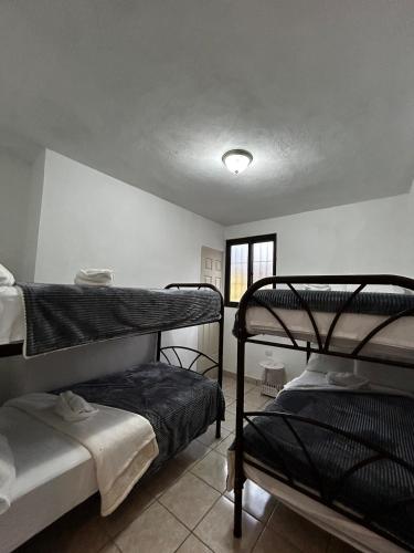A bed or beds in a room at Los Arcos la Ermita
