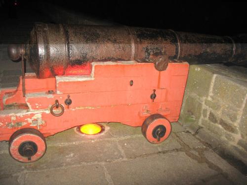 a fire hydrant sitting on the side of a street at Hôtel La Porte Saint Pierre-Logis Hôtel Intra Muros in Saint Malo