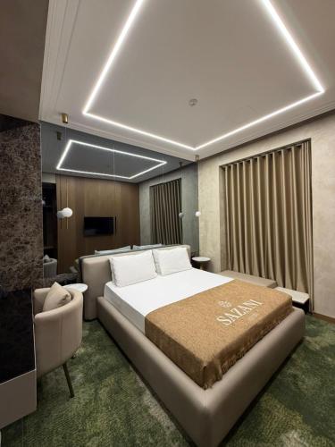 Postelja oz. postelje v sobi nastanitve Sazani Hotel