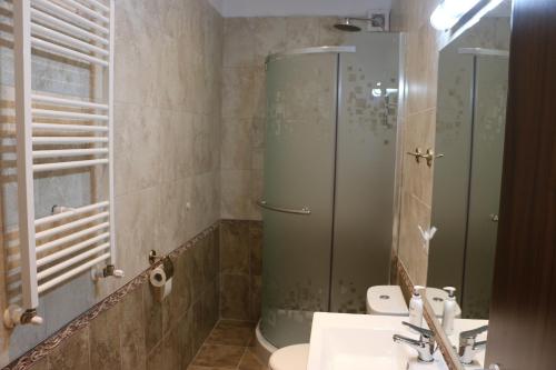 Koupelna v ubytování Corso Comfort Apartments