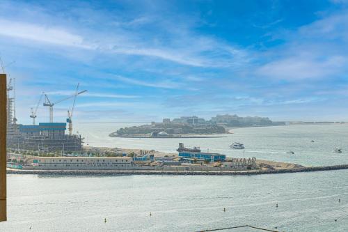 a train station in the water next to the ocean at FIVE Palm Luxury 1BR Apartment with Stunning Views in Dubai