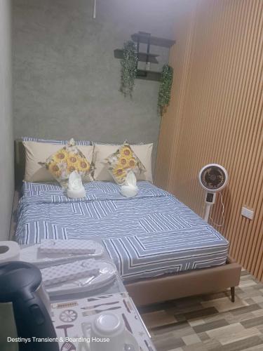 a bed in a room with two lamps on it at Secret Room Bliss in Baguio