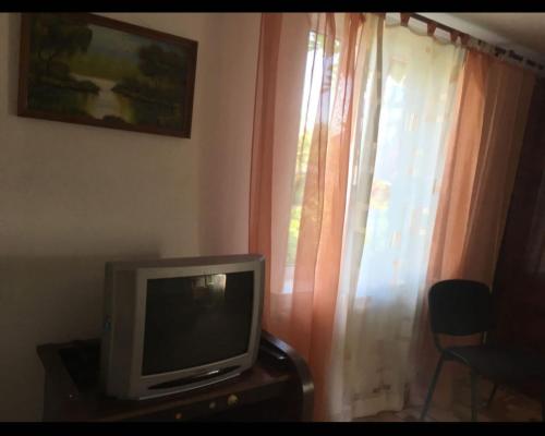 Apartamente Manjeru tesisinde bir televizyon ve/veya eğlence merkezi