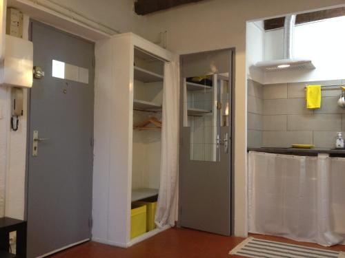 Η κουζίνα ή μικρή κουζίνα στο Appartement le Platane