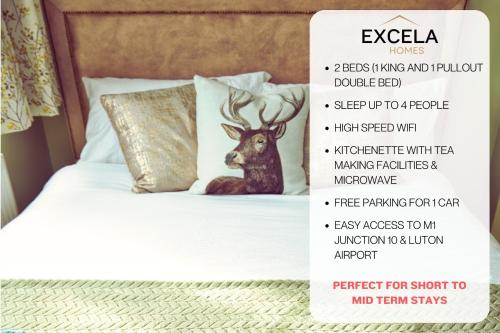 a sign with a picture of a deer on a bed at Modern Airport Annexe - Free Parking - Sleeps 4 - Near Luton Airport in Luton
