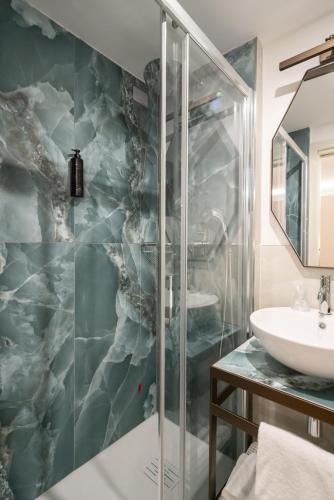 a bathroom with a shower and a sink at Albergo Cavalletto & Doge Orseolo in Venice