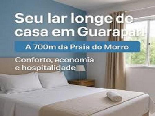 a poster for a hotel room with a bed in a bedroom at Pousada Paraiso - Número Prédio 124 in Guarapari
