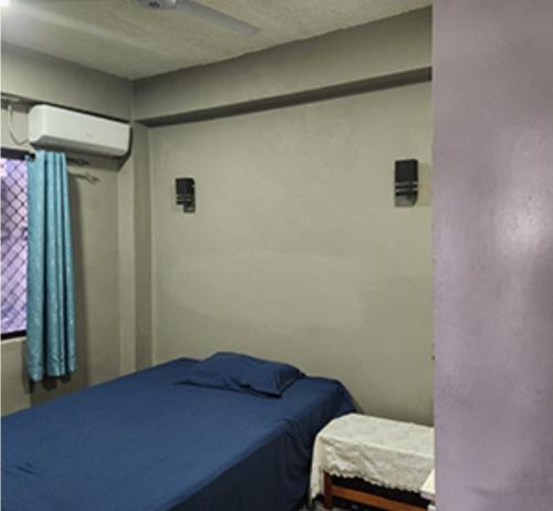 Llit o llits en una habitació de Kumar Stay Nadi
