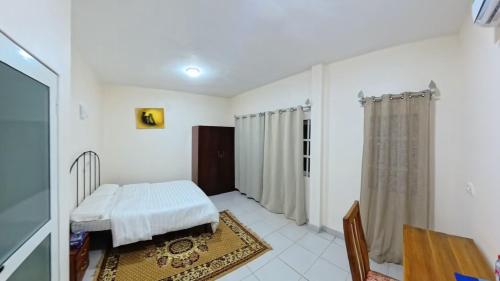 Llit o llits en una habitació de Captain Purunchi