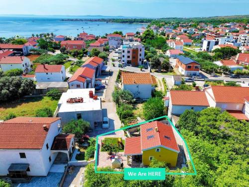 an aerial view of a city with houses at Hidden Oasis - pool, playground - 3 min from the beach in Vir