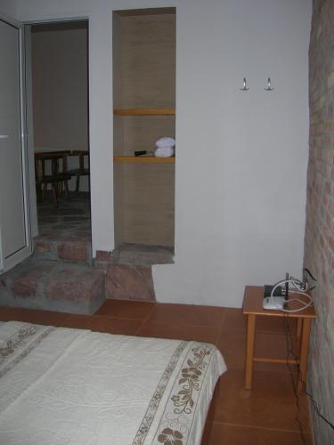Ein Bett oder Betten in einem Zimmer der Unterkunft Apartments Simovic