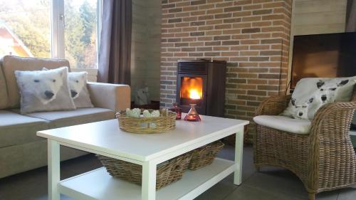 Posezení v ubytování Le Chalet de Marguerite