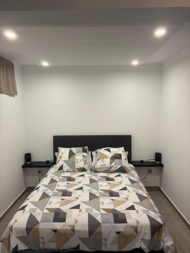 Llit o llits en una habitació de Kerrala Suite