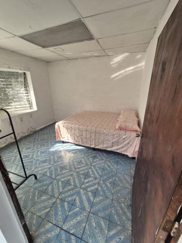 Llit o llits en una habitació de Apartamento