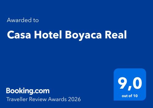 a sign that says casa hotel bologaza real at Casa Hotel Boyaca Real in Bogotá