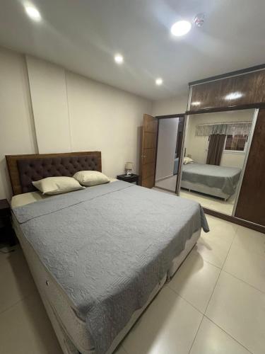 Llit o llits en una habitació de Departamento amoblado en edificio Valentinas