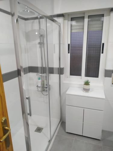 a bathroom with a shower and a sink at Entrevías in Albacete