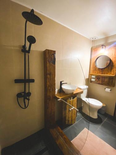 a bathroom with a toilet and a sink at Vientos - La Yareta in San Pedro de Atacama