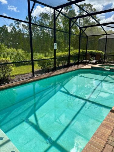 Spacious 8BR Family Villa with Pool, Game Room & BBQ, Kissimmee, near Disney! photo 5