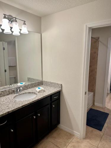 Spacious 8BR Family Villa with Pool, Game Room & BBQ, Kissimmee, near Disney! photo 15