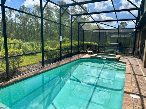 Spacious 8BR Family Villa with Pool, Game Room & BBQ, Kissimmee, near Disney! photo 32