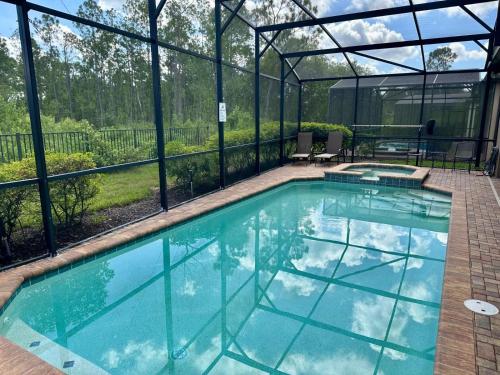 Spacious 8BR Family Villa with Pool, Game Room & BBQ, Kissimmee, near Disney! photo 33