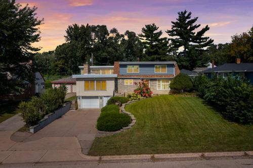 a house with a lawn in front of it at Burban Bungalow in Maplewood
