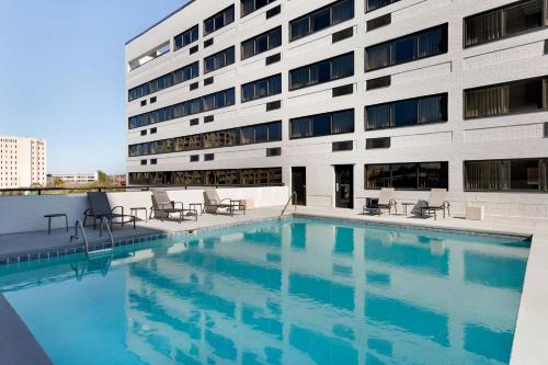 a swimming pool in front of a building at Fairfield by Marriott Inn & Suites Charleston Downtown in Charleston