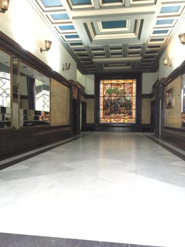 an empty room with a ceiling and a window at Best place in Plaza Mayor Lima, Pizarro building in Lima