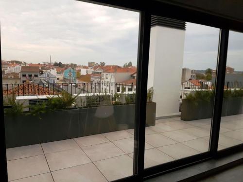 a view from the window of a balcony at Innapartments - São Gonçalinho in Aveiro
