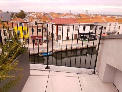 a balcony with a view of a city at Innapartments - São Gonçalinho in Aveiro