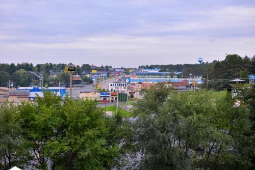 a view of a town with trees and buildings at Atlantis Family Waterpark Hotel, an Ascend Collection Hotel in Wisconsin Dells