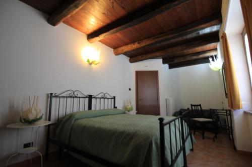 Postel nebo postele na pokoji v ubytování Agriturismo Davide