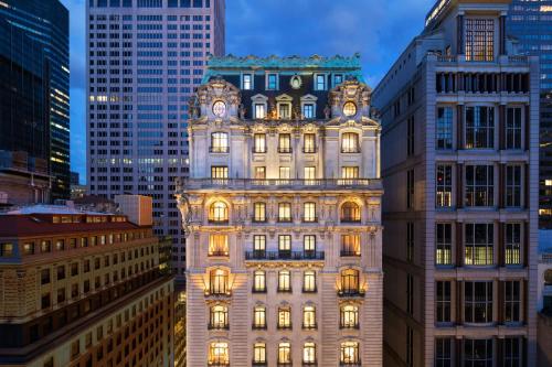 a building in the middle of some buildings at The St. Regis New York in New York